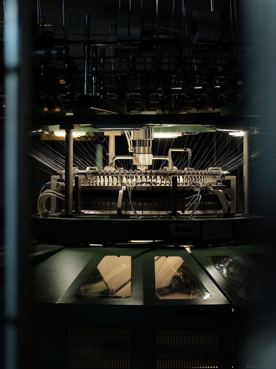 Close-up of an industrial textile production machine operating in Bursa, Turkey